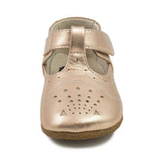 Baby shoe in metallic rose gold leather front view