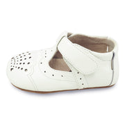 cora perforated baby shoe in milk, side view