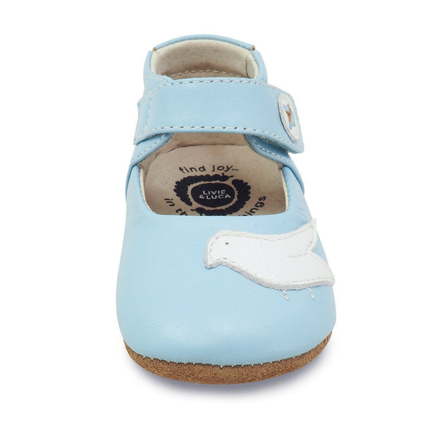 Powder blue baby shoe with bird appliqué, front